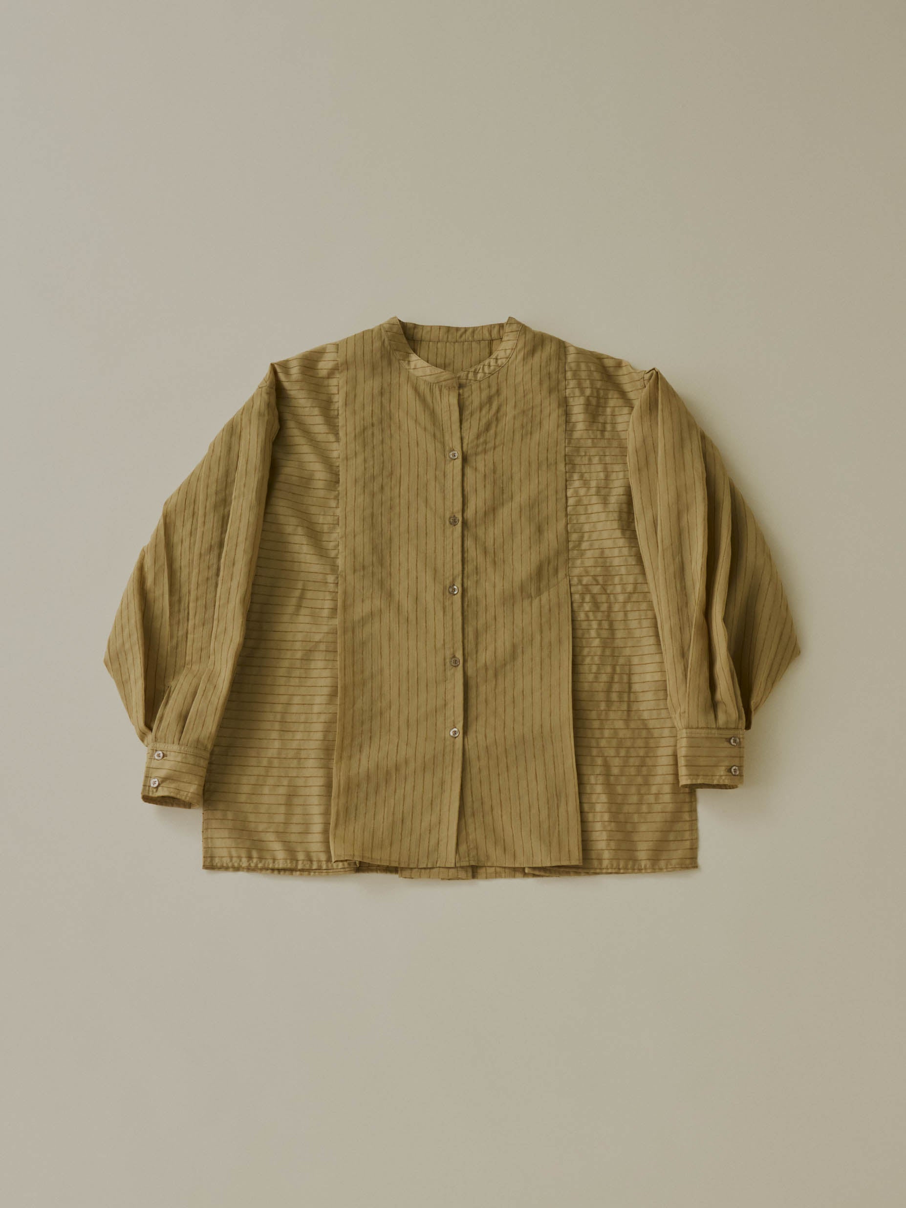 volume stripe tuck shirt